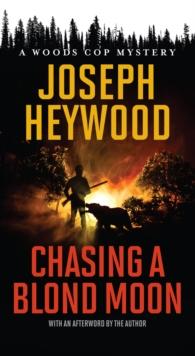 Chasing a Blond Moon : A Woods Cop Mystery