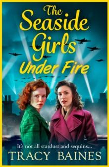 The Seaside Girls Under Fire : The BRAND NEW instalment in Tracy Baines' gripping wartime saga series for 2024