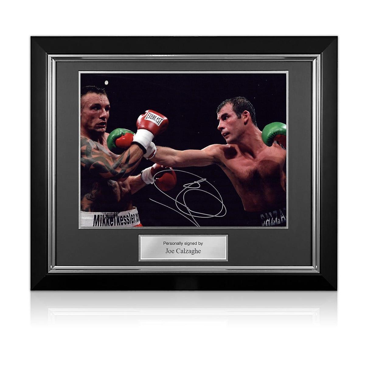 Exclusive Memorabilia Joe Calzaghe Signed Boxing Photo: Fighting Mikkel Kessler. Deluxe Frame