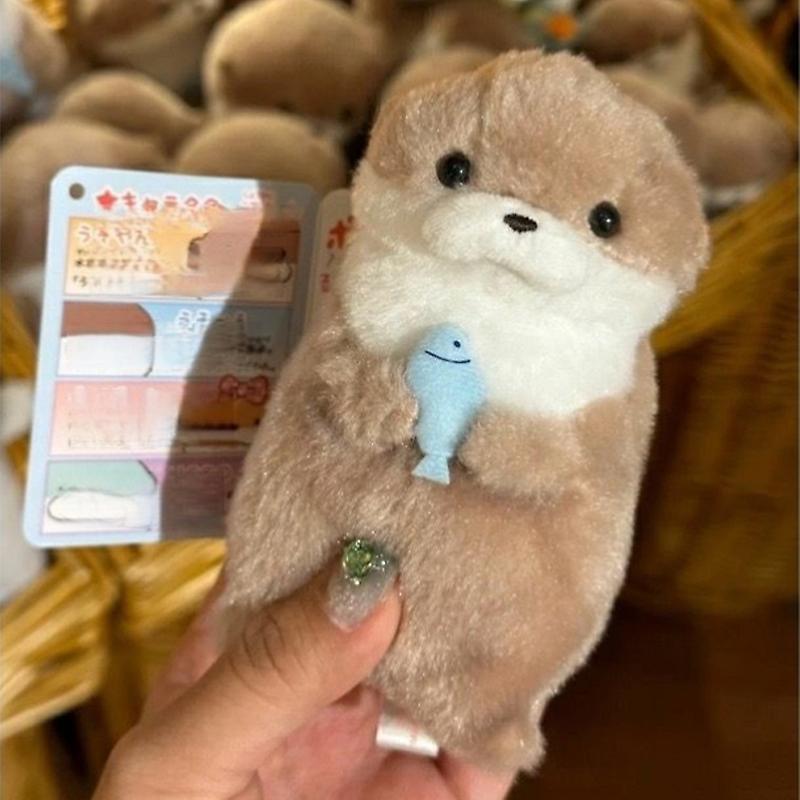 He Fei Mao Qiang Dian Zi Shang Wu You Xian Gong Si 1Pcs Cute Otter Holding Fish Plush Doll Lovely Gift Pendant For Girls 1 Piece